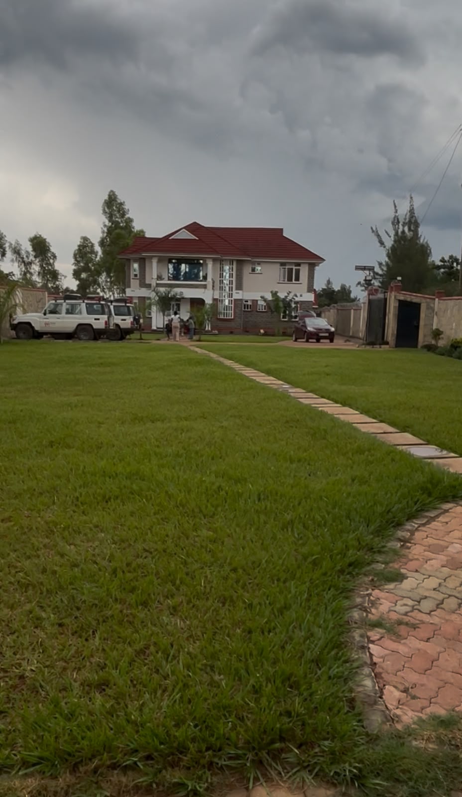 The villa set in green grounds